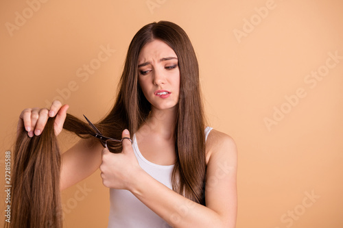 Portrait of disappointed lovely cute people person hold hand millennial worried new style stylist hair salon cosmetology medicine look wear top singlet isolated pastel beige background