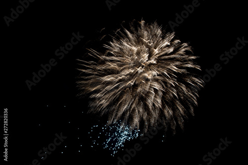 fireworks golden ball explosion in the night holiday sky