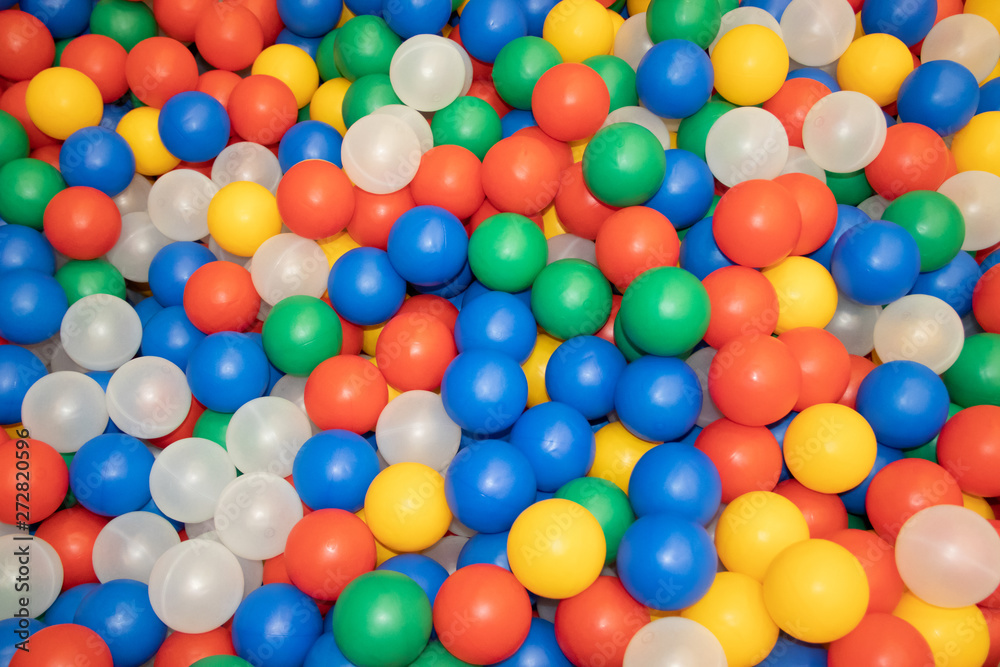 Balls for a dry pool background. Background of many colored plastic balls. Baby Delight Bright colored balls. Plastic balls Balls for a dry pool background. Background of many colored plastic balls. Baby Delight Bright colored balls. Plastic balls