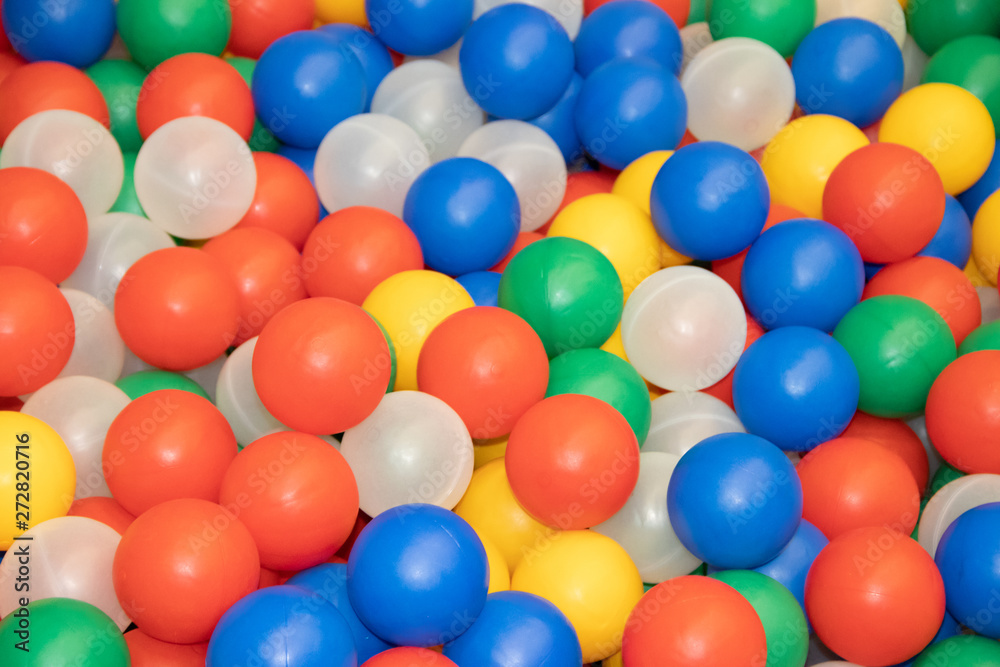 Balls for a dry pool background. Background of many colored plastic balls. Baby Delight Bright colored balls. Plastic balls Balls for a dry pool background. Background of many colored plastic balls. Baby Delight Bright colored balls. Plastic balls