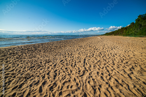 empty white sand beach with no people © Martins Vanags