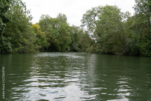 Landscape with French Clain river in Poitiers France through forest