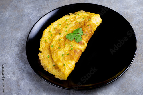 Wallpaper Mural Omelette with tomatoes slide, coriander and scallion. Torontodigital.ca