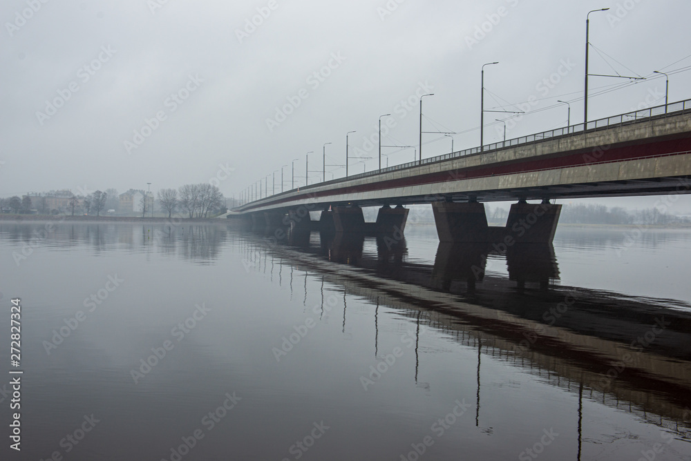 concrete brick bridge over the river