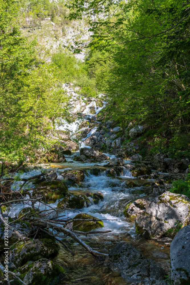Soca river near its spring at the Soca Valley in Slovenia Soca river near its spring at the Soca Valley in Slovenia