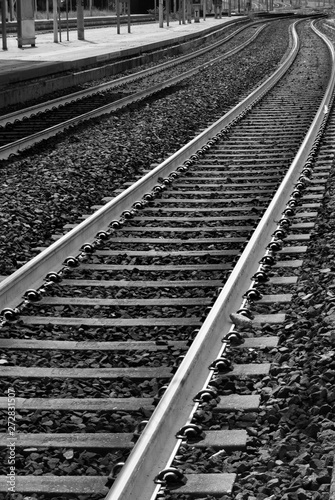 Metro tracks outdoors and black and white