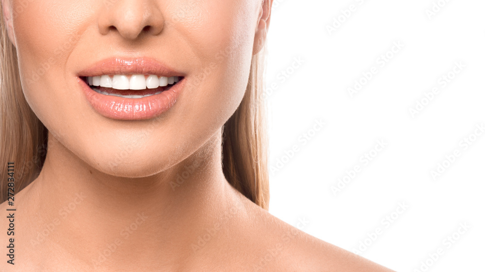Close up smiling woman portrait on white background. Teeth care and teeth whitening concept Close up smiling woman portrait on white background. Teeth care and teeth whitening concept