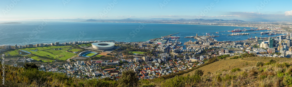Amazing panoramic view of beautiful Cape Town from Signal Hill showing V&A waterfront, harbour sea point, soccer stadium, Green Point and Robben Island out to sea. Western Cape. South Africa