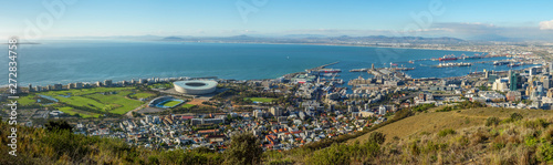 Amazing panoramic view of beautiful Cape Town from Signal Hill showing V&A waterfront, harbour sea point, soccer stadium, Green Point and Robben Island out to sea. Western Cape. South Africa photo
