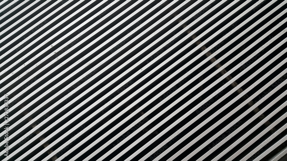 Close up view of metal stripes background of interior walls and floor texture.