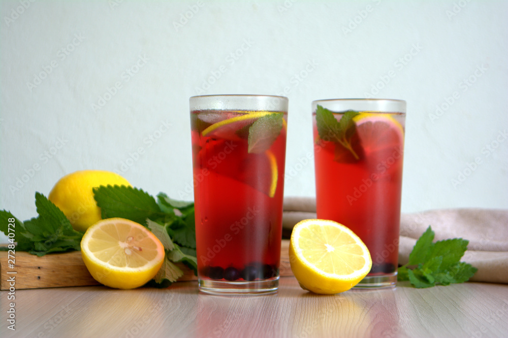 Berry lemonade or sangria in glasses Summer refreshing drink Berry lemonade or sangria in glasses Summer refreshing drink