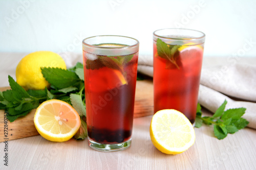 Berry lemonade or sangria in glasses Summer refreshing drink