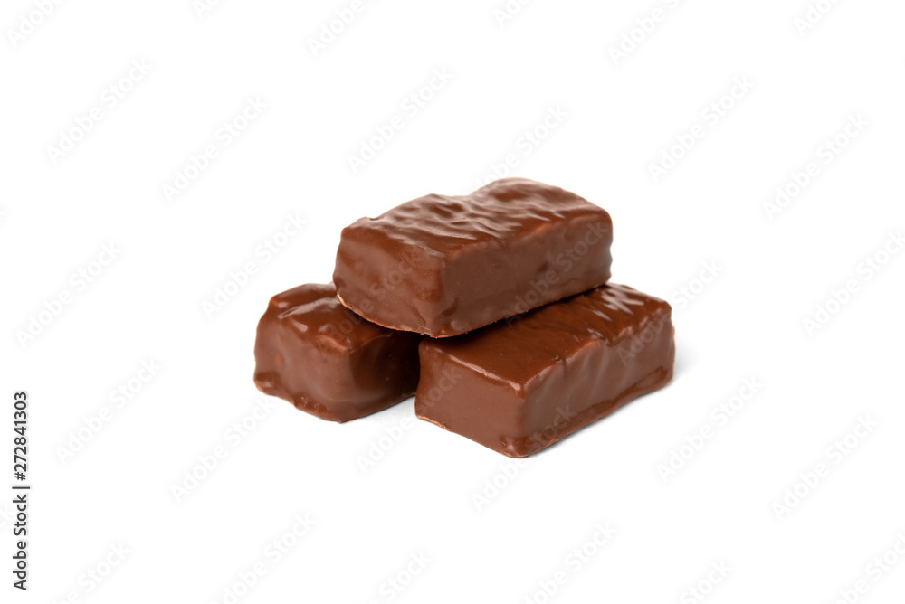 Chocolate sweet with caramel and peanut isolated on white background. Chocolate sweet with caramel and peanut isolated on white background.