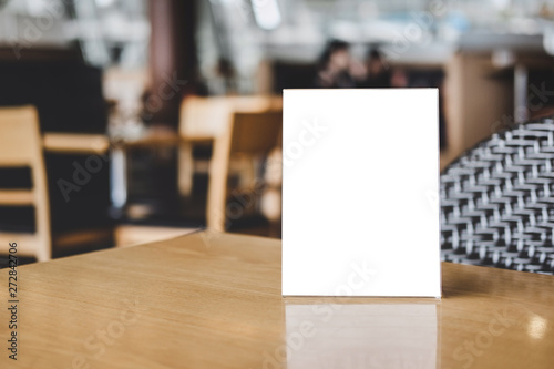 Mock up acrylic frame posters pattern template forms background, blank menu frame on table in coffee shop stand for your text of display your product photo