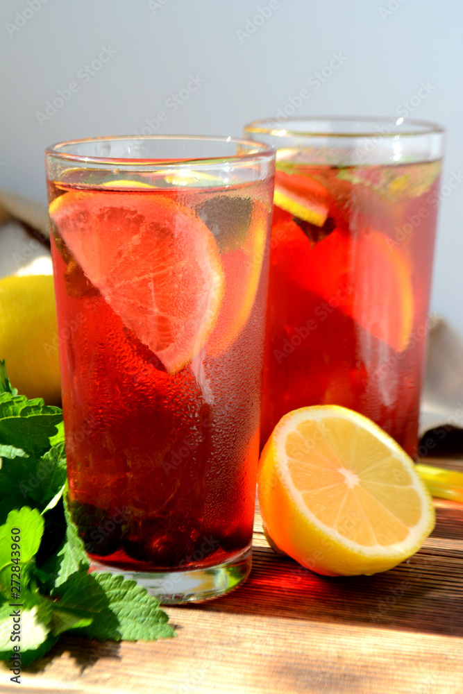 Berry lemonade or sangria in glasses Summer refreshing drink Berry lemonade or sangria in glasses Summer refreshing drink