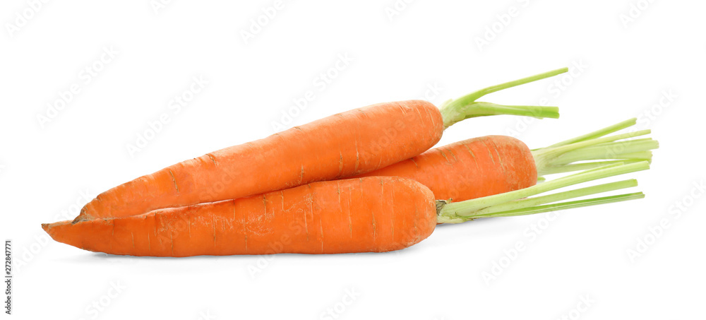 Fresh ripe carrots on white background. Wholesome vegetable Fresh ripe carrots on white background. Wholesome vegetable