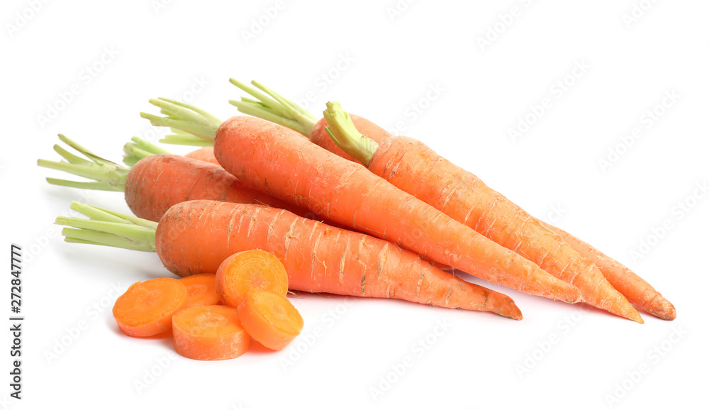 Whole and sliced ripe carrots on white background Whole and sliced ripe carrots on white background