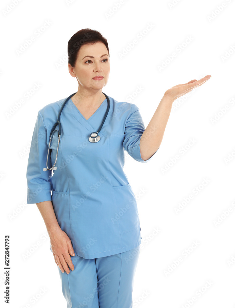 Portrait of female doctor in scrubs isolated on white. Medical staff Portrait of female doctor in scrubs isolated on white. Medical staff