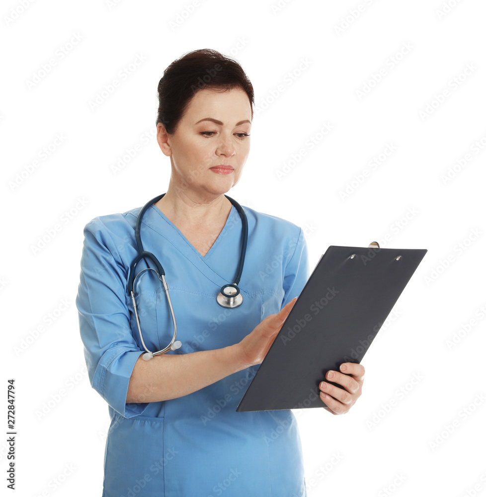 Portrait of female doctor in scrubs with clipboard isolated on white. Medical staff Portrait of female doctor in scrubs with clipboard isolated on white. Medical staff