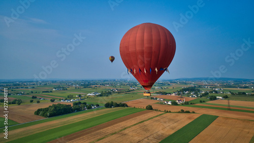 Aerial View of Hot Air Balloons Trying to Launch in a Wind as Seen by a Drone