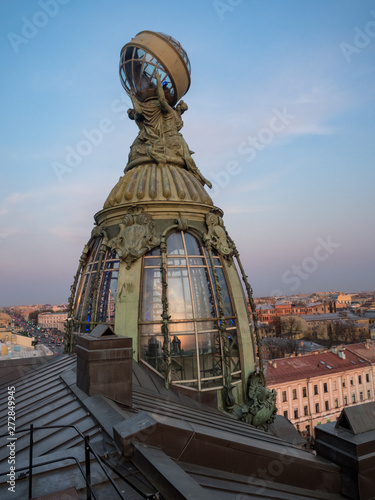 Saint Petersburg, Russia - May, 2019: Art facade of Zinger (Singer) company historic building or House of Books on Nevsky Prospect built in 1902-1904 by the architect Paul Suzor photo