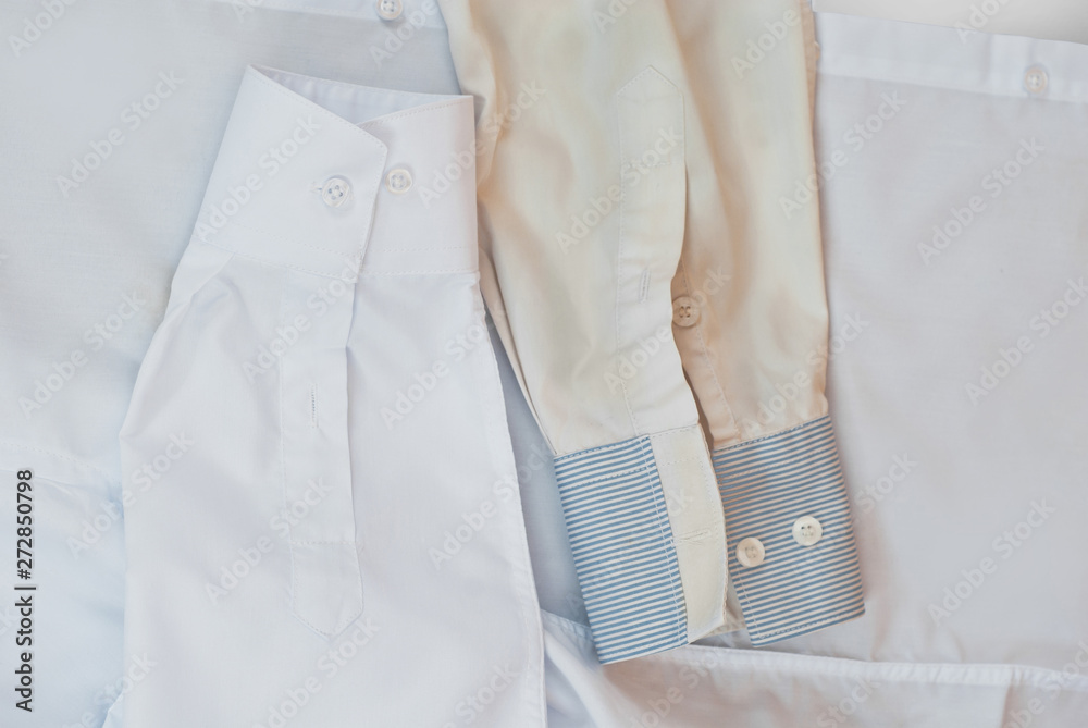 Clean and dirty shirt together. Two white shirts in one shot. The