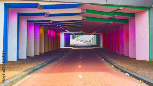  colored led lights illuminate the Kostverloren railway underpass for pedestrians and bicycles photo