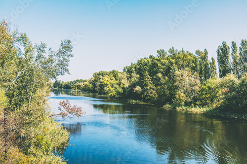 Beautiful summer landscape with little river.