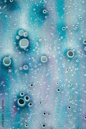 SOAP SUDS ON A CAR WINDOW