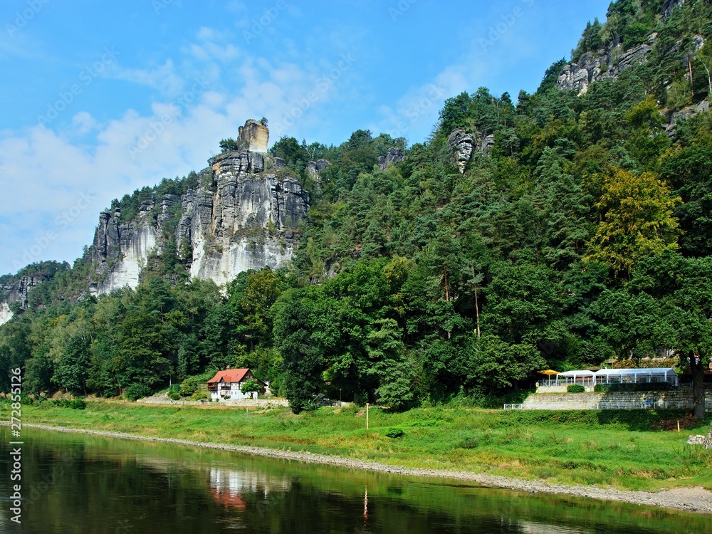 Germany-view of the rocks near town Rathen from boat Germany-view of the rocks near town Rathen from boat