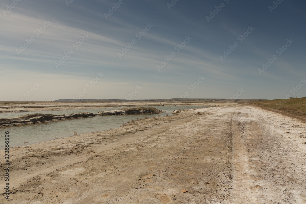 The dried-up Aral sea in summer, the water crisis on the planet and the concept of climate change