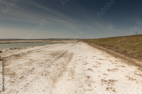 Dried-up Aral sea in summer saline  water crisis on the planet and the concept of climate change