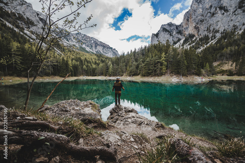 Man enjoys the view towards the Green Lake in Austria