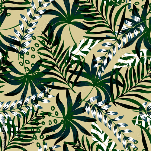 Summer bright original seamless pattern with tropical leaves and plants on beige background. Vector design. Jung print. Floral background. Printing and textiles.
