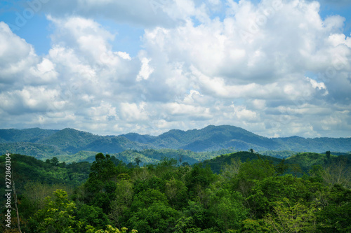 Morning green mountains  isolated on a bright sky background  at Narathiwat  Thailand
