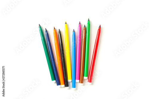 Color markers isolated on white background, top view