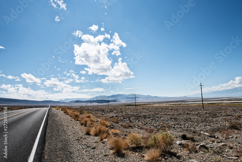 Death Valley, Highway,Nationalpark,mountains,stones,valley,Landschaftsaufnahme,clouds,road, Wolken,StraÃŸe,Berge,Einsamkeit,Unendlichkeit,lonlyness,USA;Nevada, photo