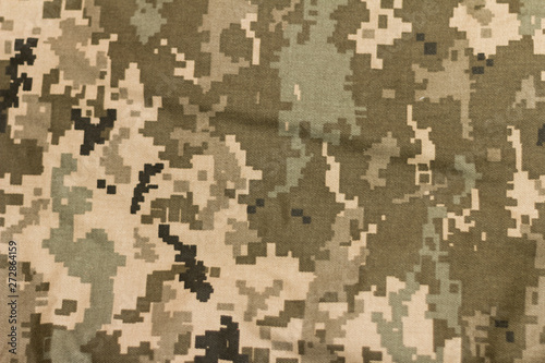 Closeup of military uniform surface.