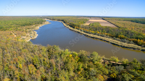 Aerial view on the lake in the middle of the forest. Alexandrovsky forest. Rostov region. Russia