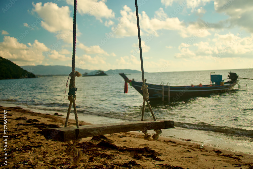 Sunrise about sea with boat in Thailand Sunrise about sea with boat in Thailand