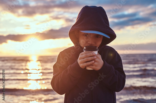 Cute little kid is enjoying...