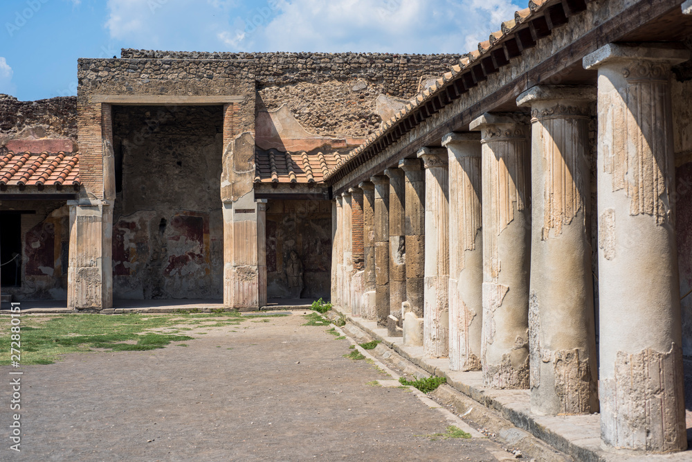An ancient cobbled street in the ruins of Pompeii, Italy, 2019.