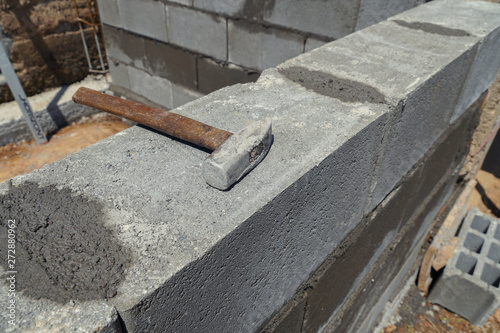 Detail of  tools and concrete bricks.