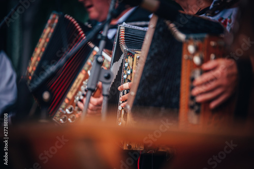 Photos Accordion band, detail photo. Traditional music fest