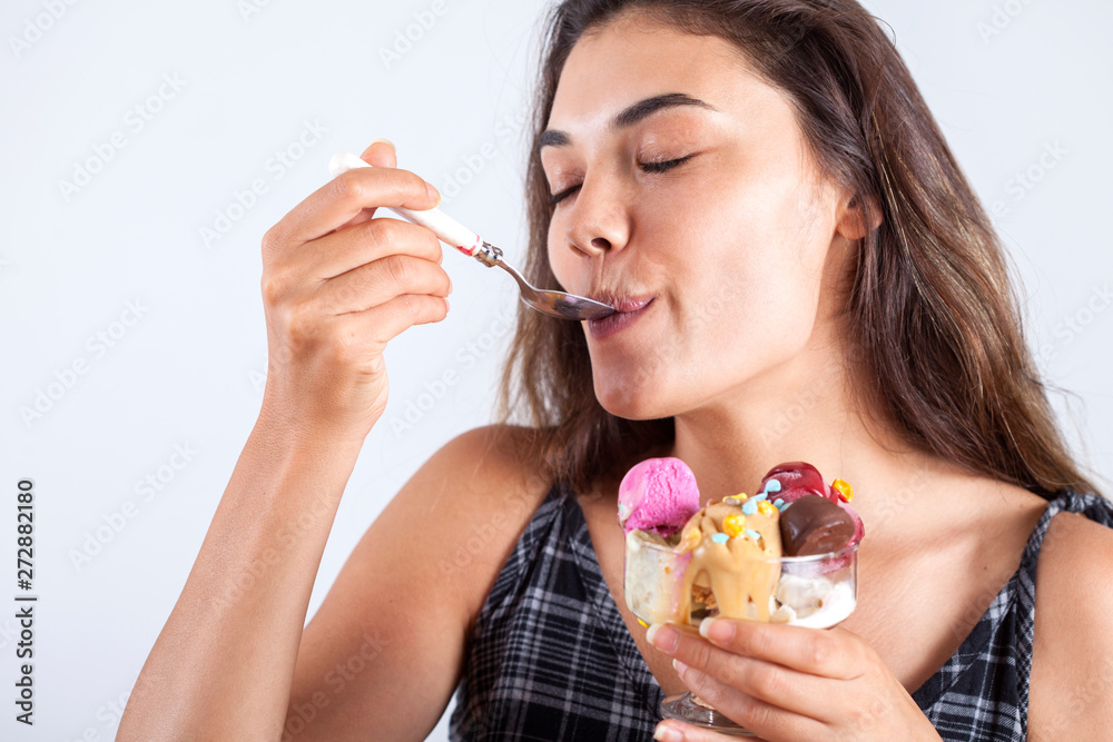 beautiful young woman eating ice cream beautiful young woman eating ice cream