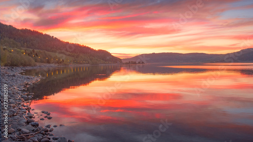 Photography bright sunset on the river entrance to the city of Oslo in Norway