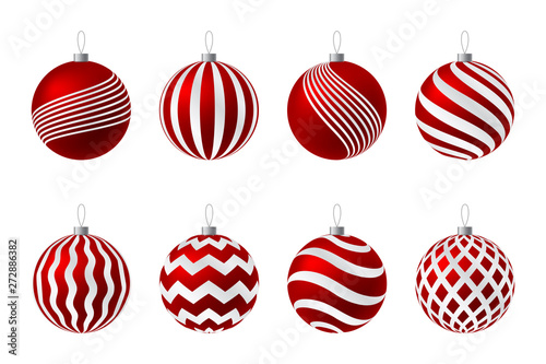 Set of red Christmas balls with gold ornament on a white background.