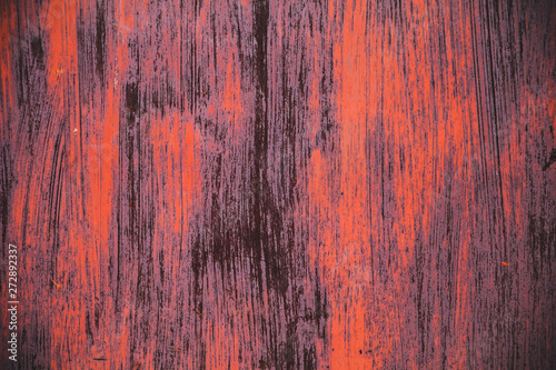 Abstract colorful wall texture and background. Close-up iron surface with old red and brown paint