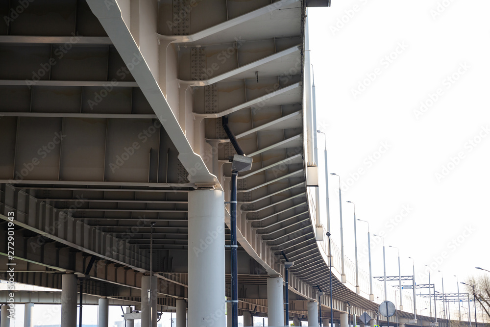 Fototapeta premium architecture of a modern automobile bridge, geometry of lines