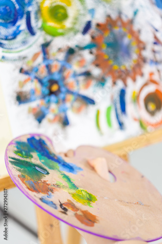 Wallpaper Mural Artist painting art, selective focus close-up on palette Torontodigital.ca